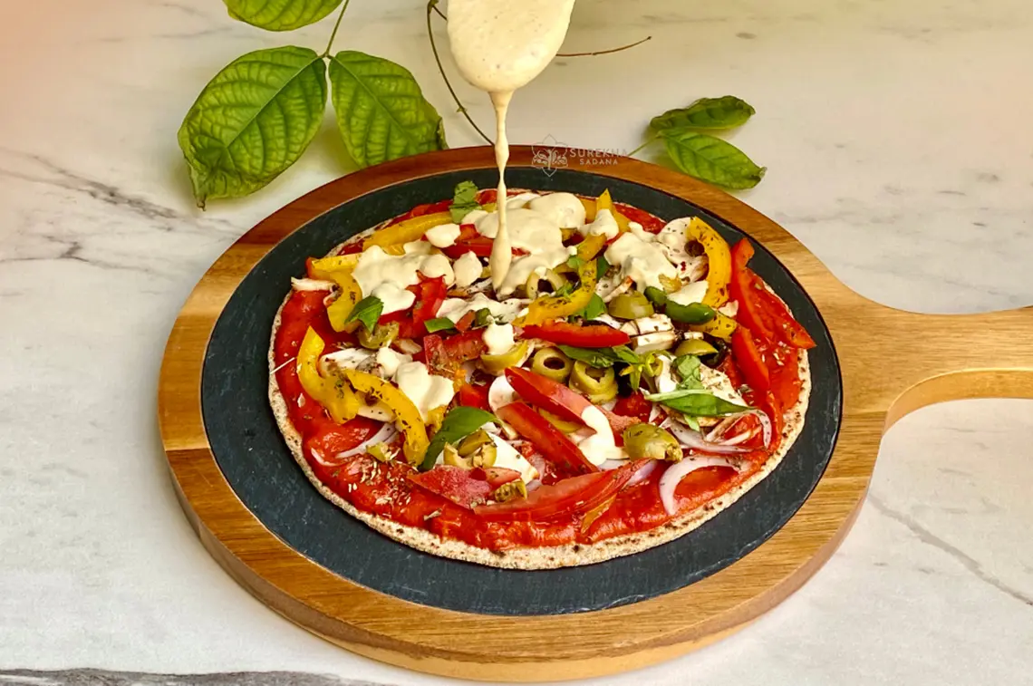 Home made Cheesy Thin crust Pizza - Surekha Sadana